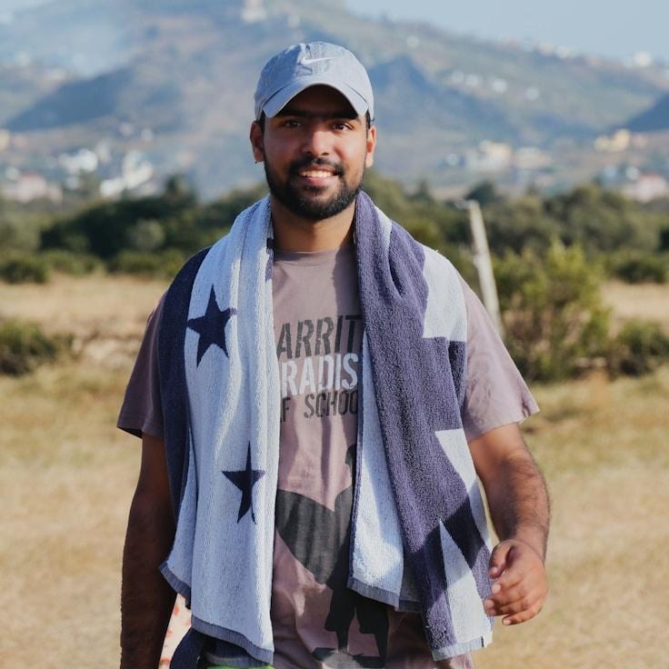 Kaveri Mehta, Lead Design Curator at Soft Matrix Harbor, reviewing corporate floral arrangements